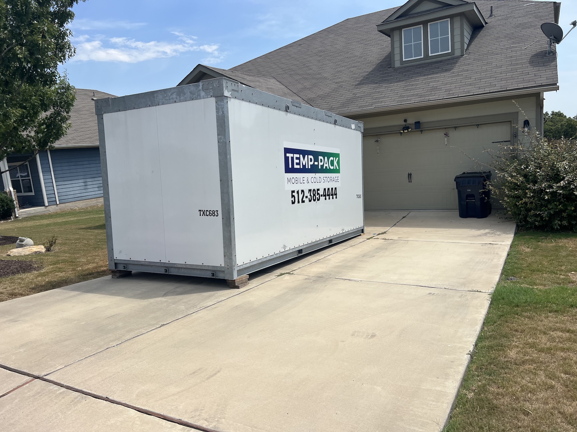 TEMP-PACK storage container outside a home